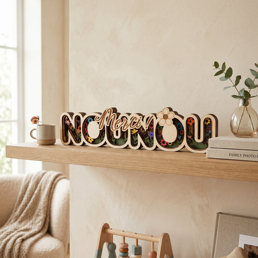 L'Atelier de Lylou Déco bois "Merci Nounou" multicouches avec motif floral et papillons.