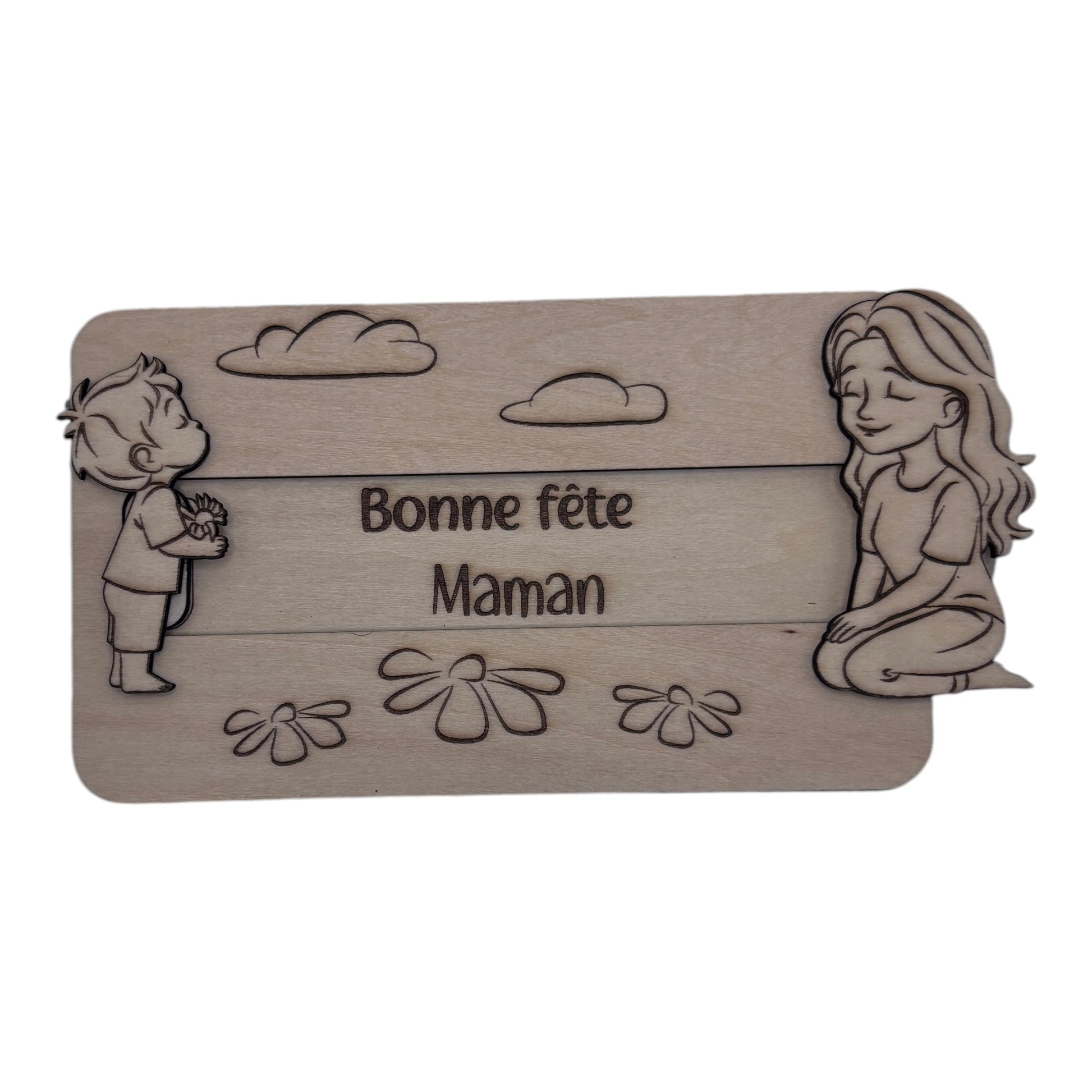 Plaque en bois L'Atelier de Lylou gravée "Bonne fête Maman" avec un enfant offrant des fleurs et une femme assise. Idéal pour la fête des mères.