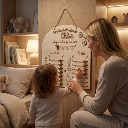 L'Atelier de Lylou : tableau de routines personnalisé en bois pour enfant, avec curseurs pour suivre les habitudes du matin et du soir.