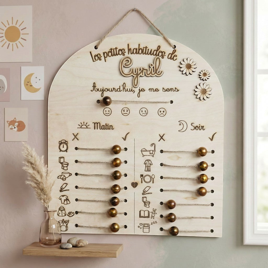 Tableau de routines personnalisé en bois L'Atelier de Lylou avec curseurs pour suivre les habitudes du matin et du soir, et indiquer l'humeur.