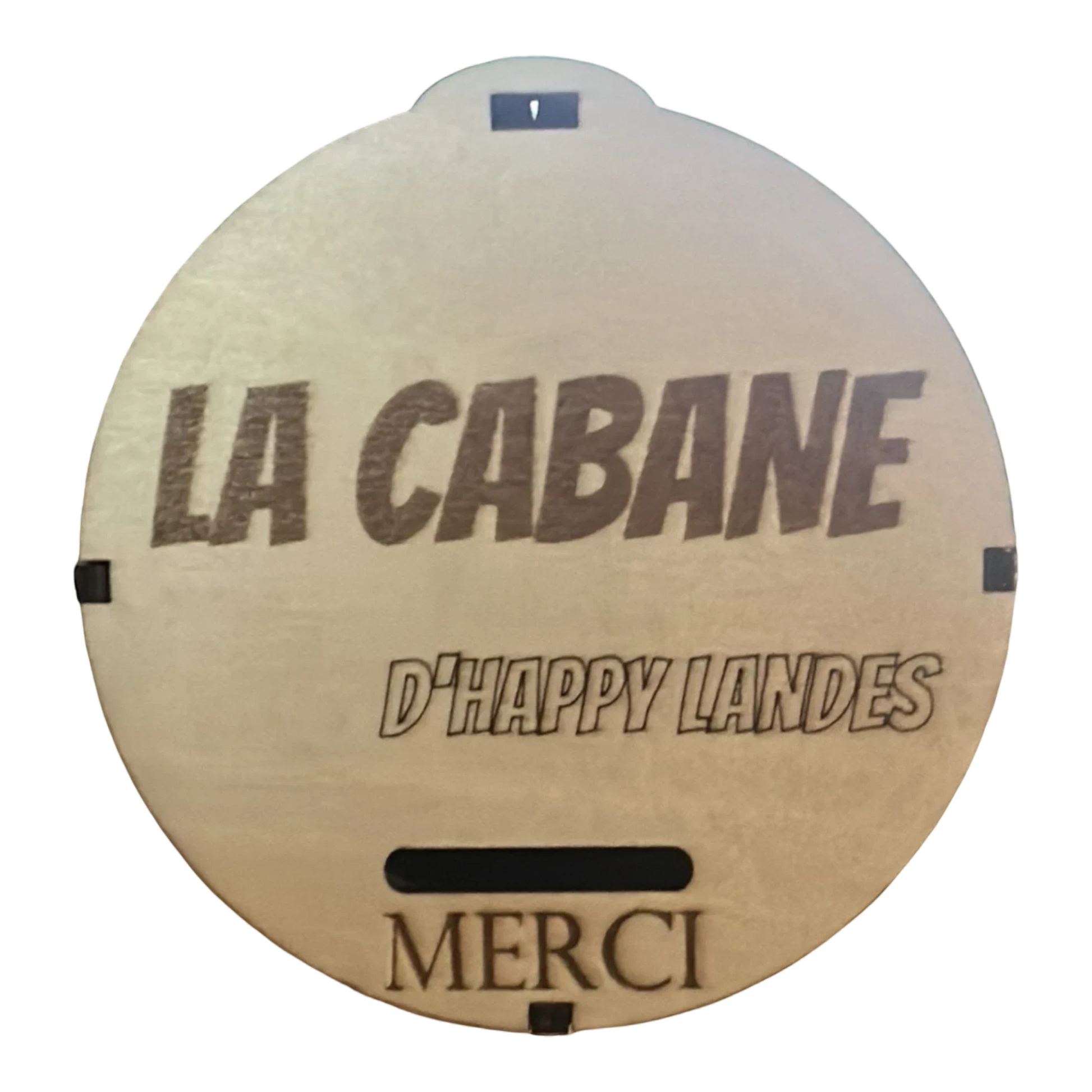 Tirelire ronde en bois L'Atelier de Lylou gravée "LA CABANE D'HAPPY LANDES MERCI"