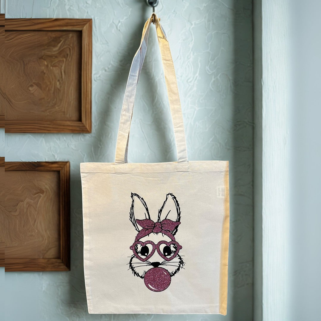 L'Atelier de Lylou Tote bag blanc en coton avec motif lapin mignon, lunettes cœur et bulle de chewing-gum.